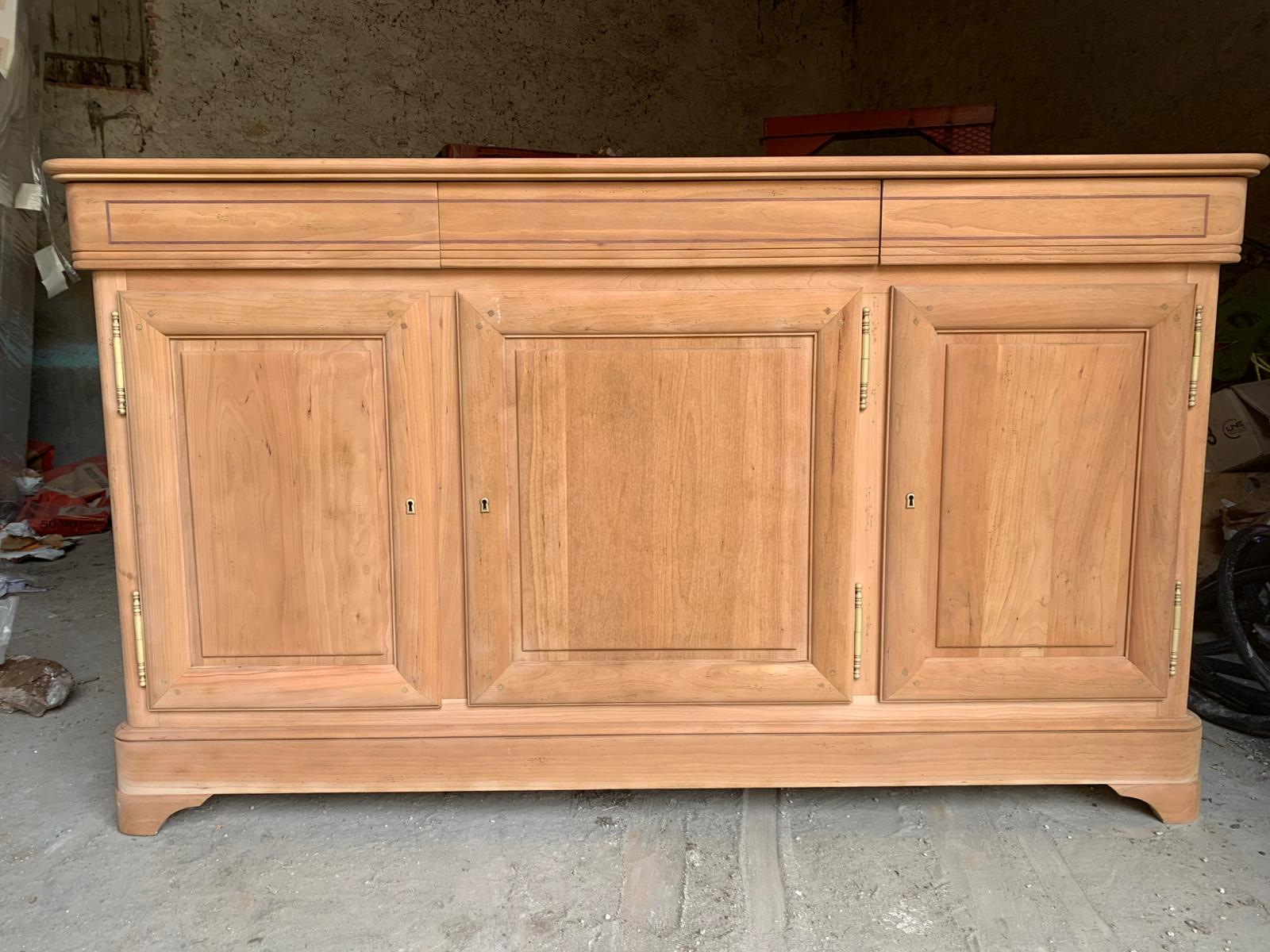 Décapage de meuble en bois par aérogommage